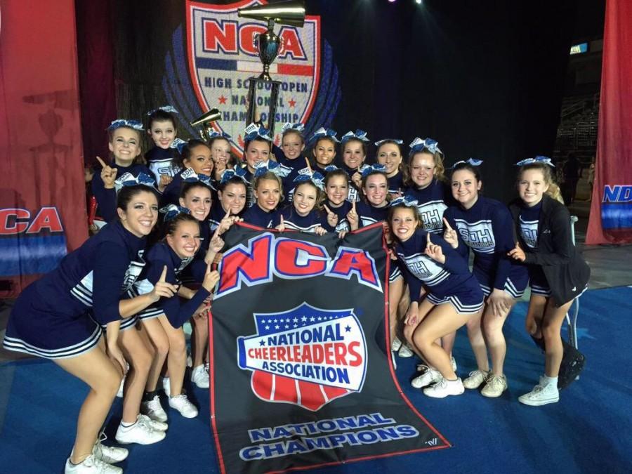 The Varsity Cheer Squad after their win.  