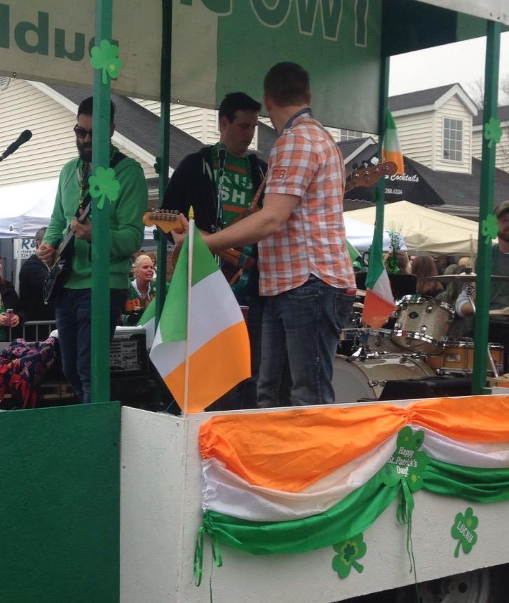 A float set up with the band playing Irish music. 