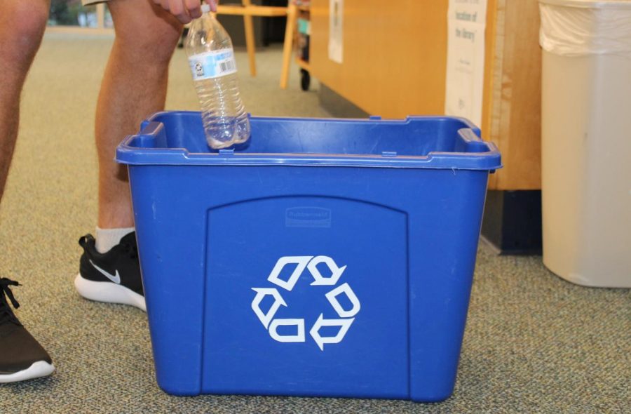 St. Dominic student recycling 