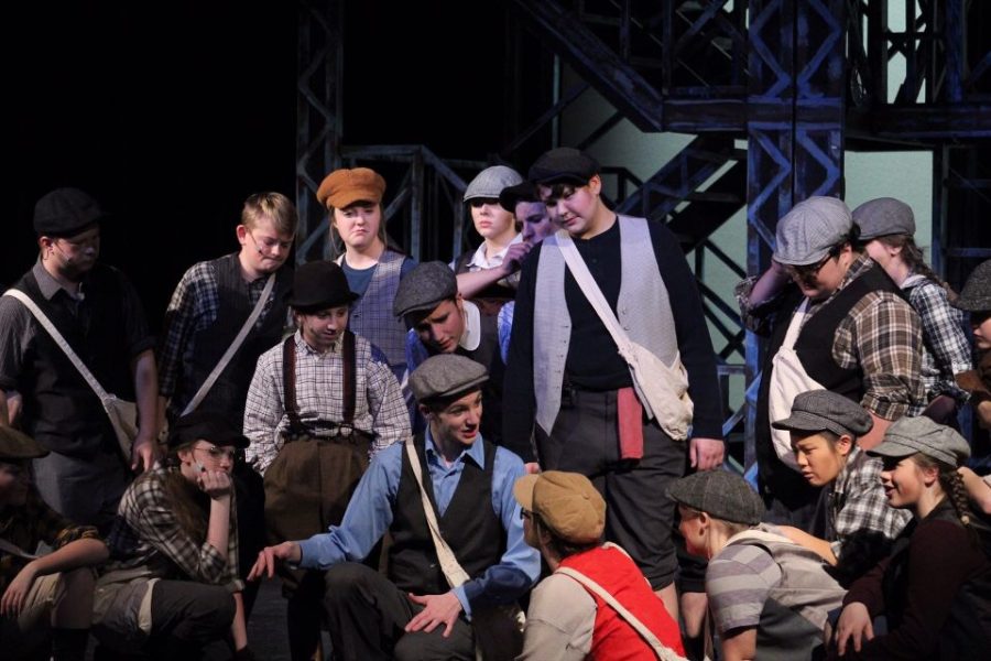 St. Dominic students in the Assumption production of Newsies.