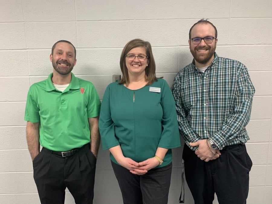 Mr. Asher (left), Ms. Hampton (middle), Mr. Winklemann right) all wearing their green shirts this Tuesday