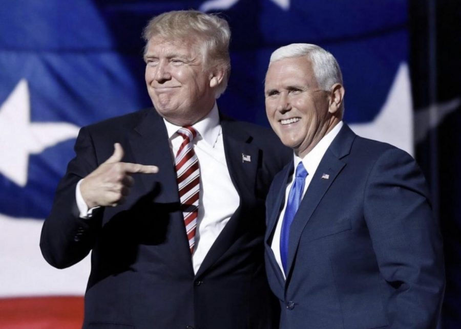 Despite all the speculation, Trump (left) still tries to keep a good image with Pence (right).