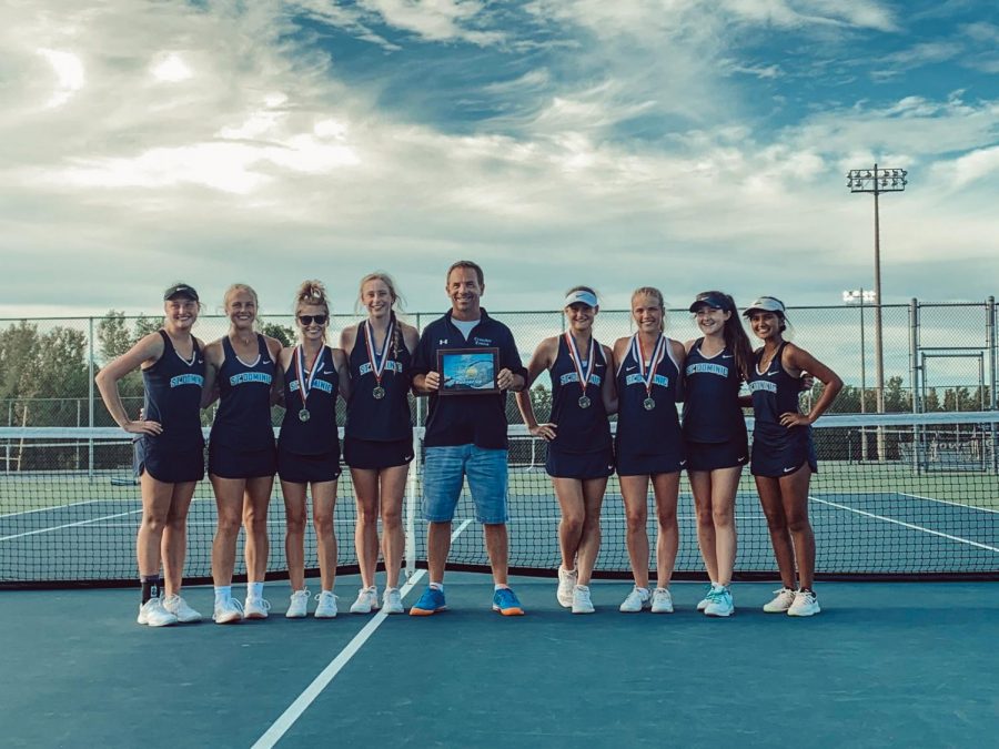 Coach Borst has been leading the tennis team to many victories these past three years.