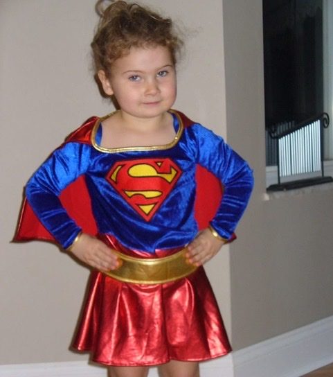Junior McKinley Curran dresses up as Supergirl ready to save herself some candy