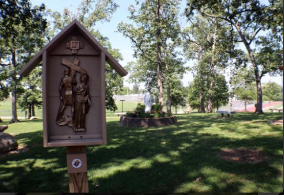 The Stations of the Cross are placed along the path in the Oak Grove.