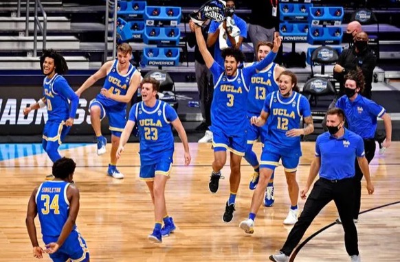No. 11 UCLA celebrates after beating No. 2 Alabama, continuing their Cinderella Story into the Elite Eight.