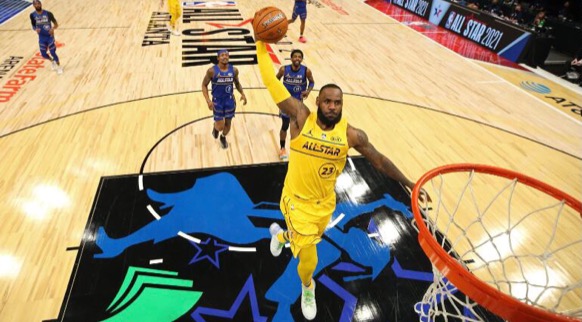 LeBron James goes for a slam dunk during the 2021 NBA All Star Game. 