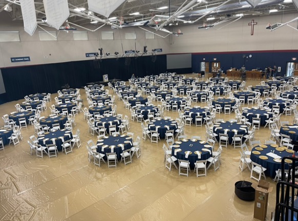 The Gala takes place in the big gym every year, with about 50 tables and 11 place settings at each