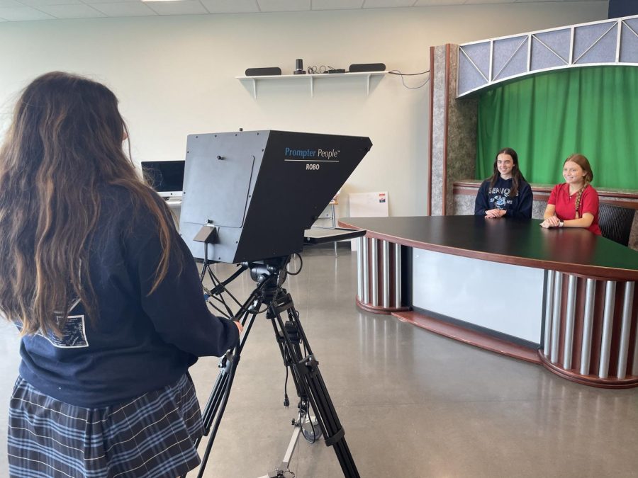 Students prepare the weekly broadcast before school every week