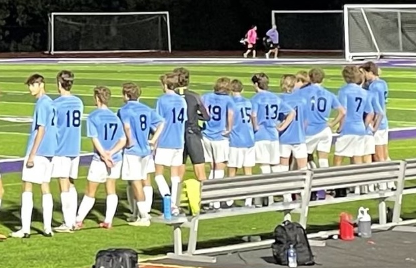The St. Dominic boys soccer team lines up pre-game.