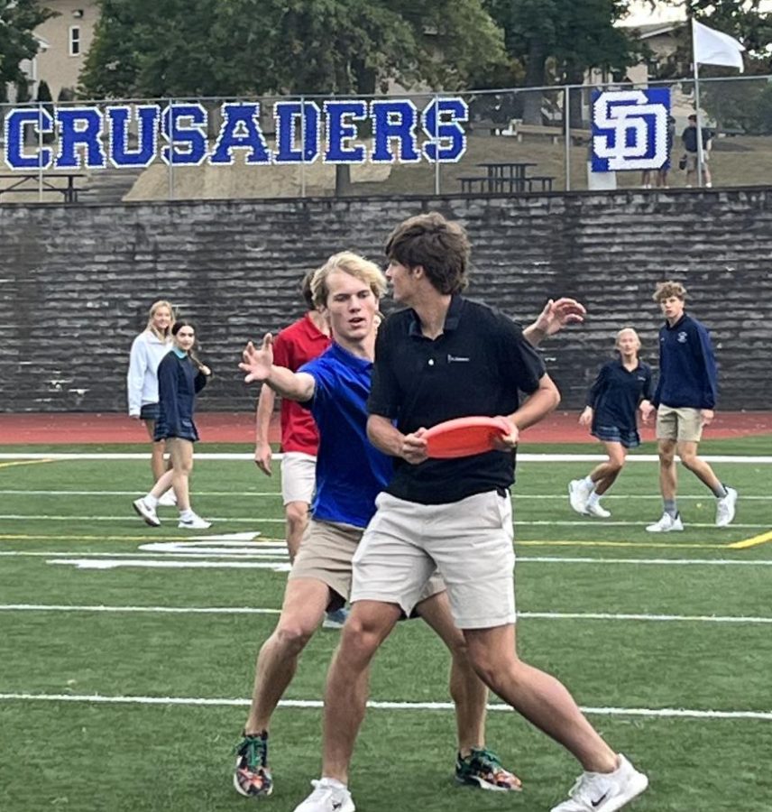 Seniors Chase Freesmeier and Tyler Willenbrink Battle to win Frisbee. 