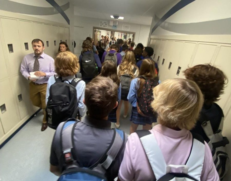 St. Dominic students walk through the halls shoulder to shoulder.