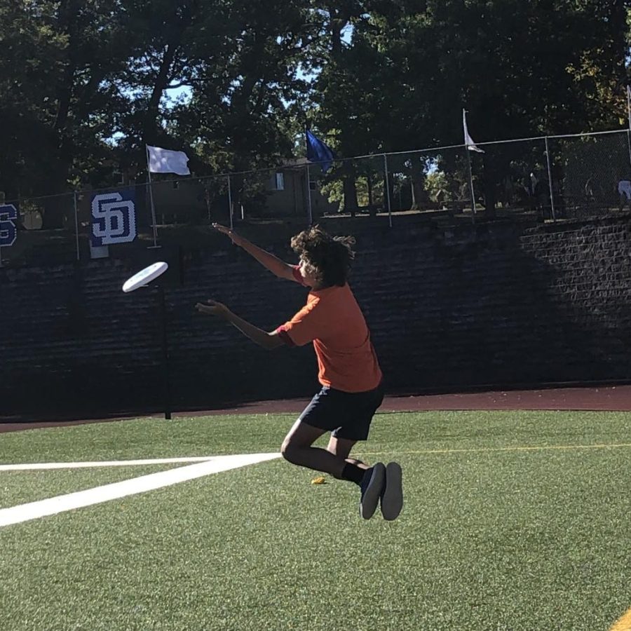 Caritas is jumping for joy after the ultimate frisbee finals.