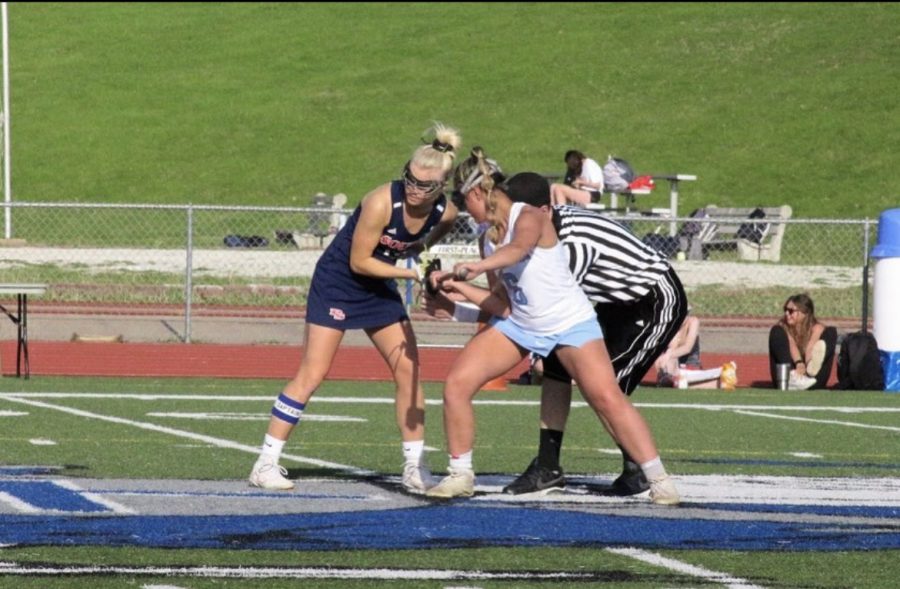 Bella Connell facing off in the draw against Parkway South.