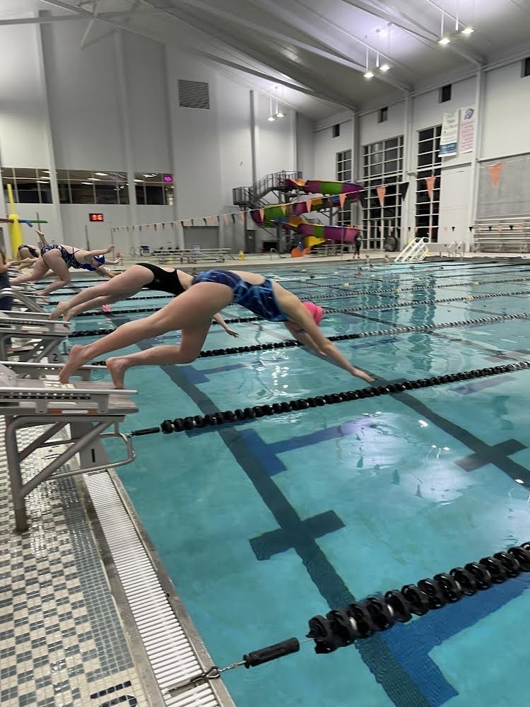 The St. Dominic swim team practicing for their upcoming season