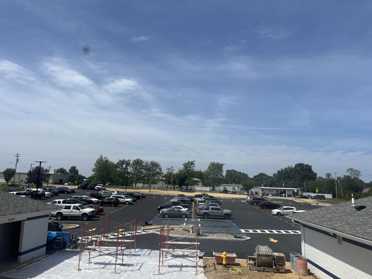 Saint Dominic parking lot getting finishing touches ready for school 